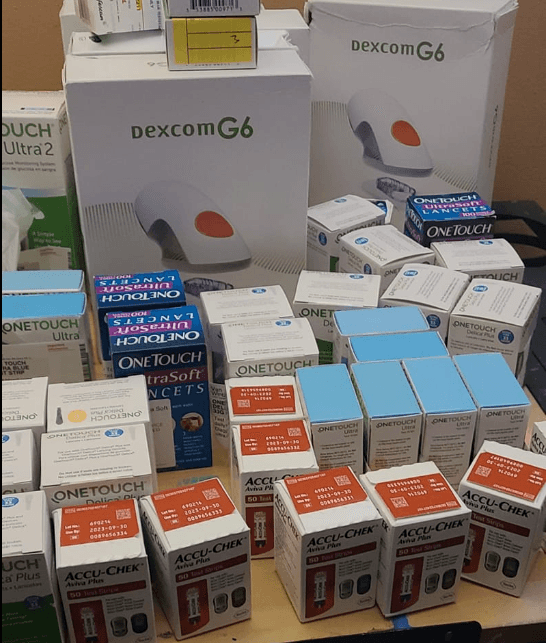Boxes of Dexcom G6 sensors and diabetic test strips ready to sell